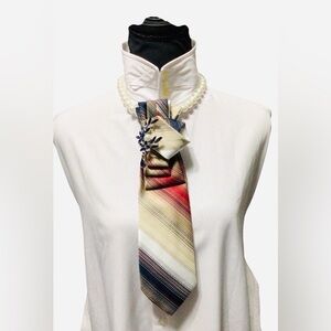 Chic Necktie with Blue Brooch Accent